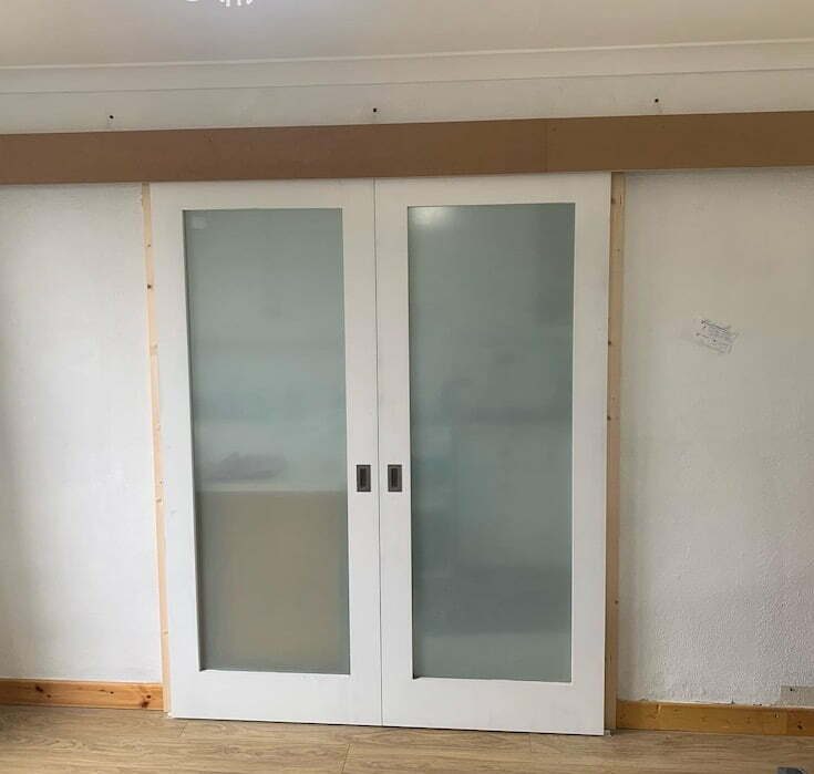 exposed double sliding doors